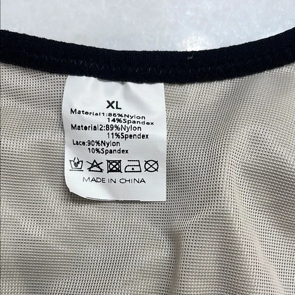 Chic Black and Cream Lace Bodysuit with Adjustable Straps - Picture 9 of 9